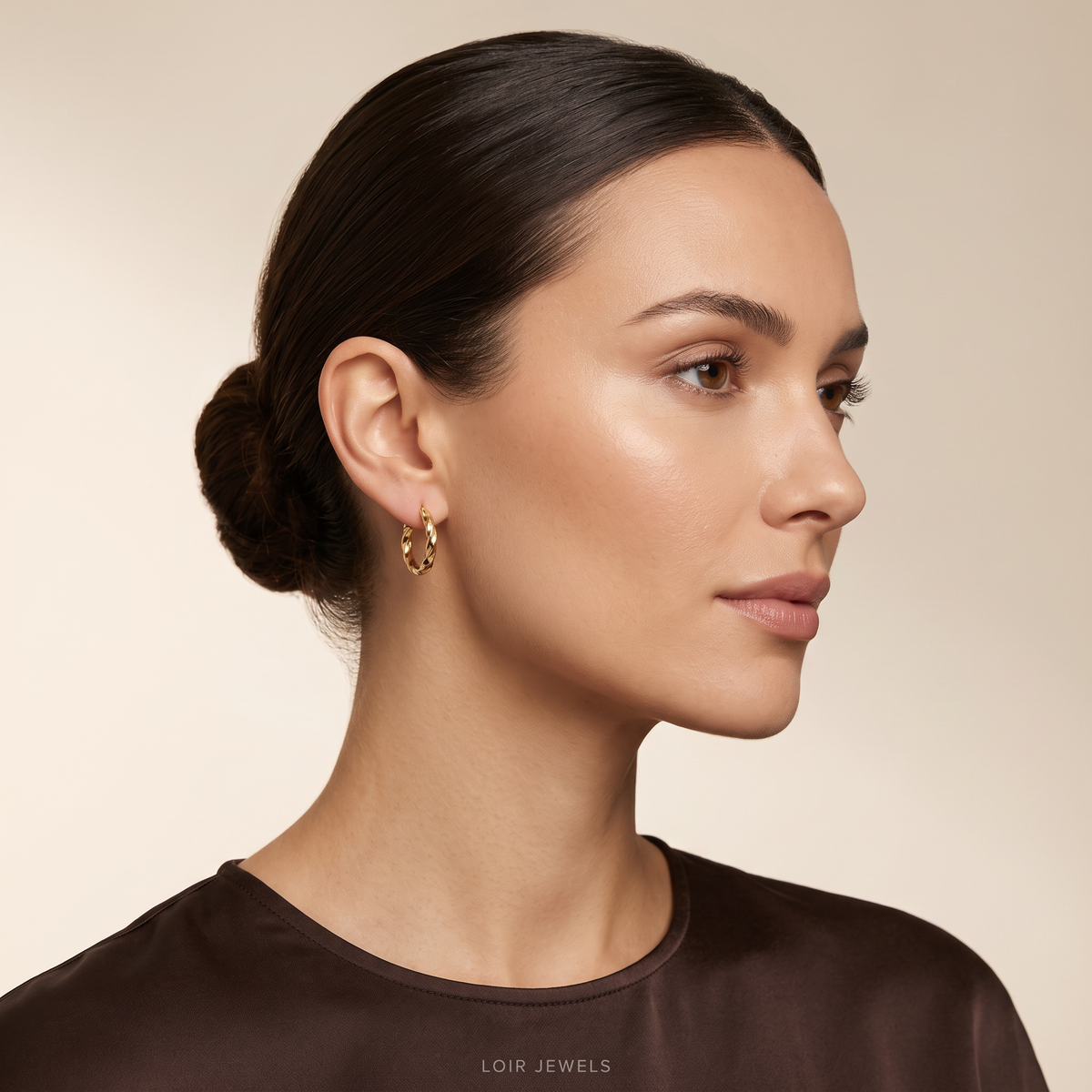 Sleek Gold Twist Hoops