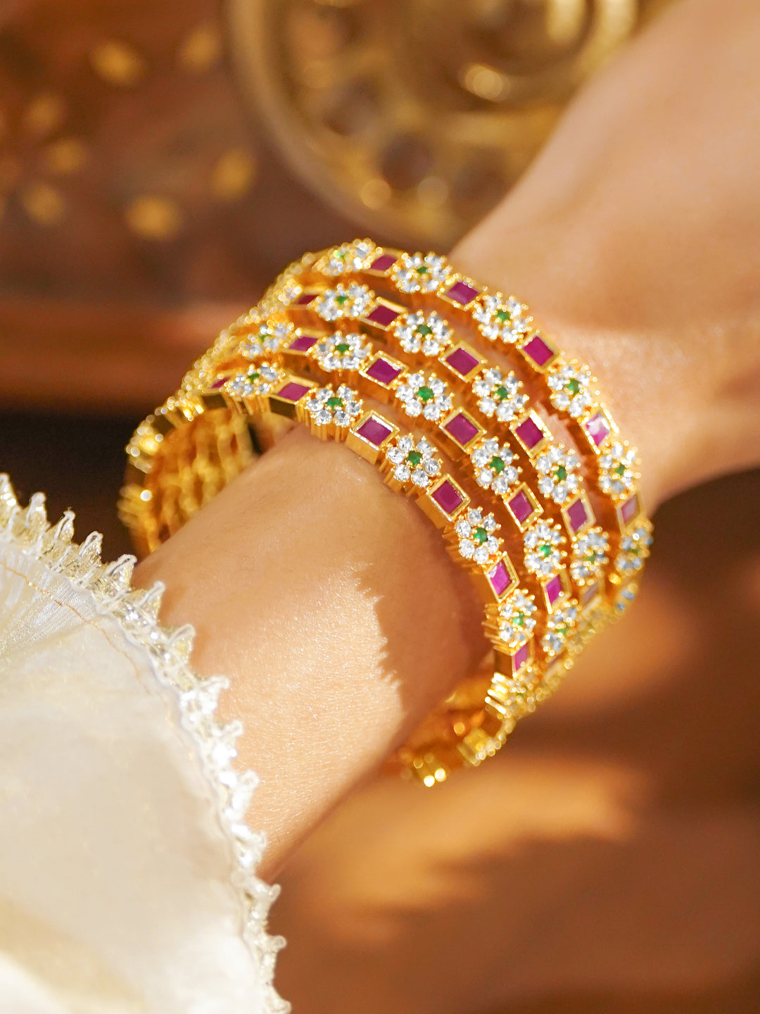 Gold Toned Multicolor Studded Bangles Set Of 4