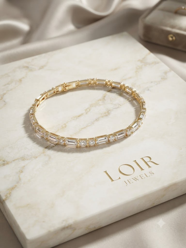 MIXED CUT EMERALD & ROUND DIAMOND TENNIS
BRACELET