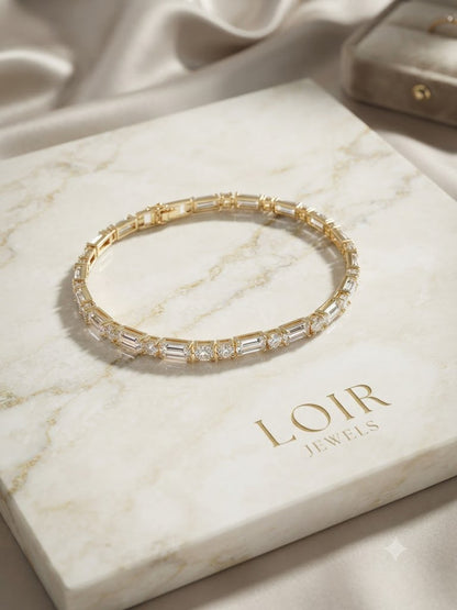MIXED CUT EMERALD & ROUND DIAMOND TENNIS
BRACELET