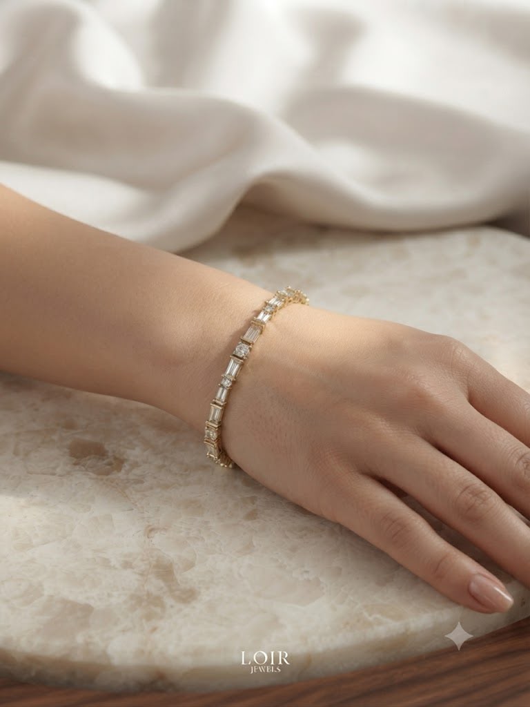 MIXED CUT EMERALD & ROUND DIAMOND TENNIS
BRACELET